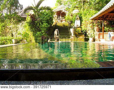 Bali, Indonesia - April 11, 2012: View Of Swimming Pool At Tanah Merah Art Resort Bali, Indonesia - 