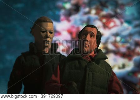 OCT 25 2020: Slasher Michael Myers of Halloween stalking Clark Griswold of National Lampoons Christmas Vacation - Neca action figure