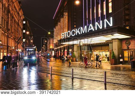 Helsinki, Finland - October 26, 2020: The Trams Are Moving On Aleksanterinkatu Street. The Rainy Aut