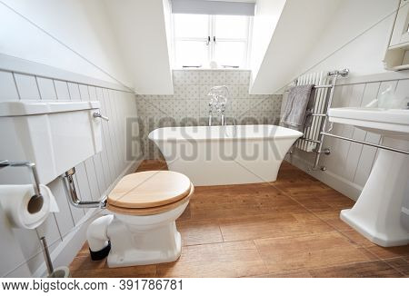 Interior View Of Beautiful Bathroom With Free Standing Bath In Family Home