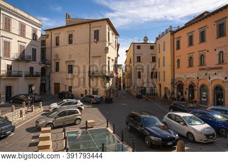 Modern Cars On Street Of  Medieval Town Of Orte In Italy.