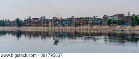 Panoramic Of A Traditional Egyptian Villages On The Bank Of The Nile River. Views Sailing On The Cru