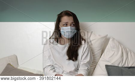 Worried Cute Female In Self Isolation Scared Of Viruses And Bacteria, Looks Depressed, Paranoia Duri