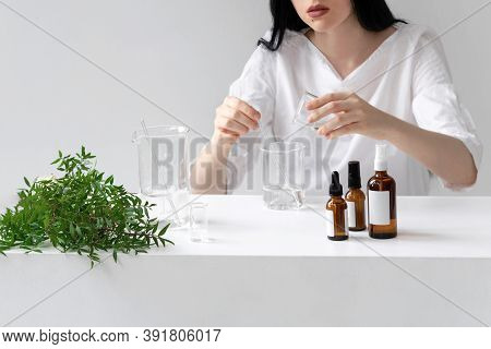 The Scientist, Dermatologist Testing The Organic Natural Cosmetic Product In The Laboratory. Vials, 