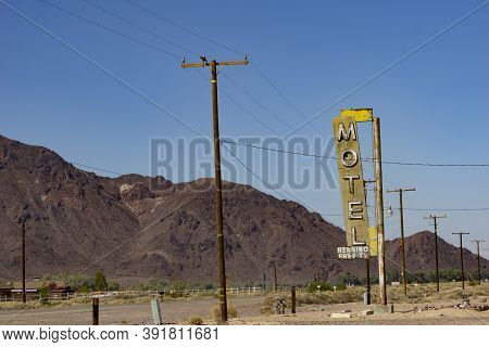 Henning Usa - October 2 2015; Old Motel Sign Along Highway On Part Route 66 Standing Among Parallel 