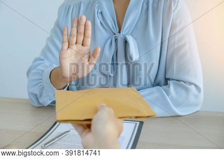 Government Officials Hand Refused To Accept Bribes From The Businessmen Offer For Signing In A Contr