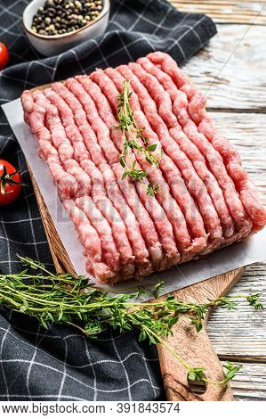 Raw Chicken, Turkey Ground Meat On A Chopping Board. Organic Forcemeat. White Background. Top View
