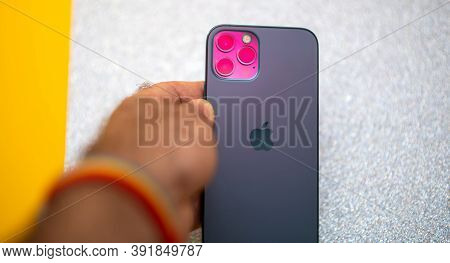 Paris, France - Oct 23, 2020: Magenta Futuristic Colro Cast On Lidar And Triple Camera Of New Iphone