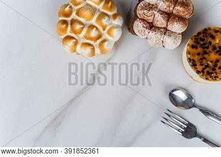 Mini Chocolate, Lemon Pie And Passion Fruit Cake.