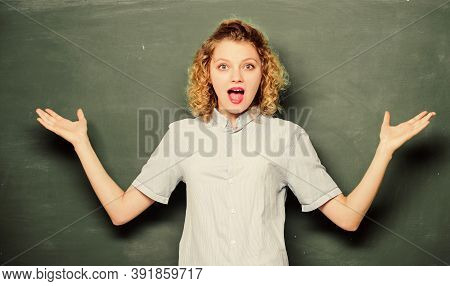 Woman Teacher In Front Of Chalkboard. Teacher Explain Hard Topic. Teacher Best Friend Of Learners. G