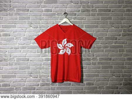 Hong Kong Flag On Shirt And Hanging On The Wall With Brick Pattern Wallpaper, Red And White Five Pet