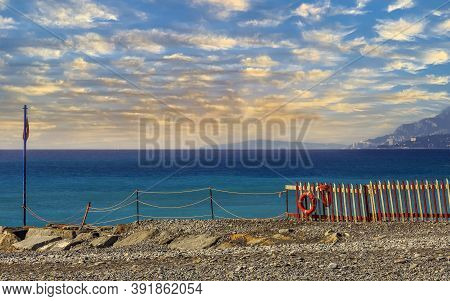 Scenic Picture Postcard View Of A Beautiful Rocky Mediterranean Beach In The Town Of Ventimiglia In 