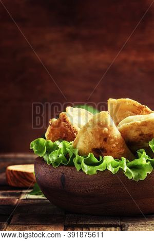 Homemade Fried Little Pies With Meat In A Bowl, Vintage Wooden Background, Rustic Style, Selective F