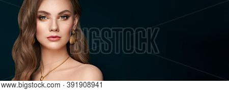 Brunette Girl With Perfect Makeup. Beautiful Model Woman With Curly Hairstyle. Care And Beauty Hair 