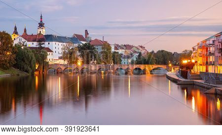 Pisek, Czech Republic. Panoramic Cityscape Image Of Pisek With Famous Stone Bridge At Beautiful Autu