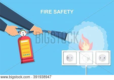 Extinguishing Fire Wiring In Home. Socket And Plug On Fire From Overload. Electrical Safety Concept.
