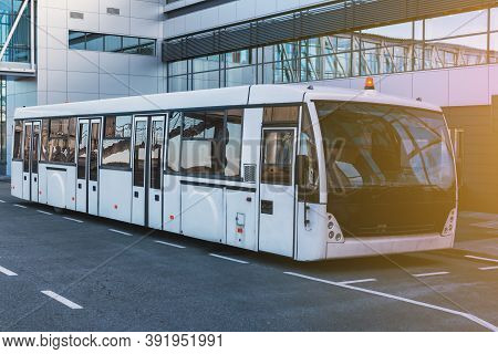The Airport Shuttle Bus Near The Terminal
