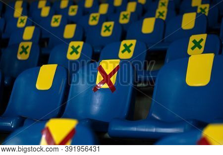 Seat With Red Symbol Sticker Placed On A Chair In Plublic For One Seat From Other People Keep Distan