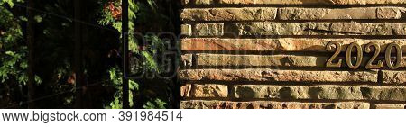 Autumn Or Fall Of 2020. Inscription In Golden Numbers 2020 On The Stone (docorative Bricks) Wall, Sy