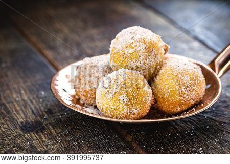 Fritule, Fried Croatian Typical Dumpling, Served Hot. Slotted Spoon With Freshly Made Homemade Bread