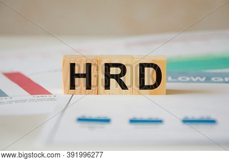 Hrd Word Written On Wooden Cubes. Hrd Text On Table, Concept.