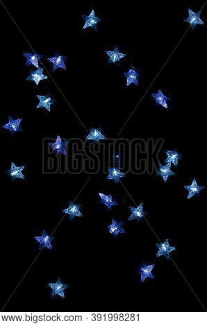 Bright Gerlands On A Dark Blue Background