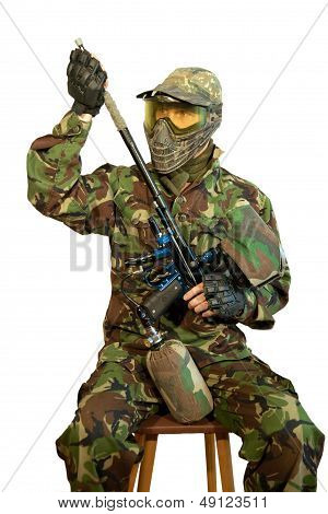 Paintballer Cleaning The Marker