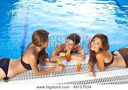 Handsome Man Chatting To Two Women