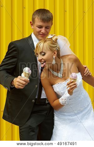 The Bride And Groom Eat Ice Cream