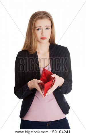 Beautiful caucasian business woman checking her empty red wallet. Isolated on white.
