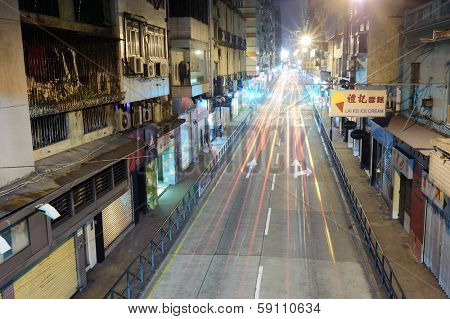 MACAO - NOV 12: Traffic lights on streets of Macao on 12 november 2011 in Macao, China. Macao a former Portuguese dependency on the SE coast of China, on the west side of the Pearl River