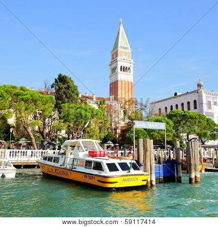 VENICE, ITALY - OCTOBER 02, 2013: Vaparetto on the berth of San Marco station in Venise