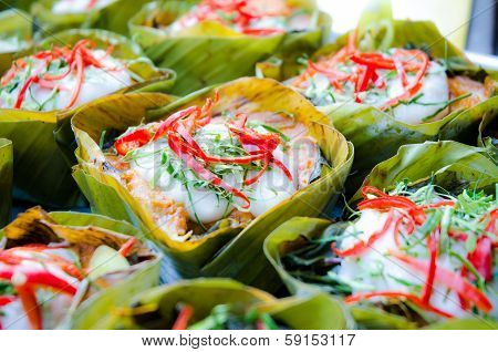 hor mok, thai food, steamed fish curry custard in banana leaf