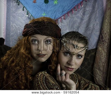Two beautifiul young women dressed as a gypsies