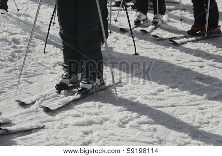 Skier wait turn for slide in whiter