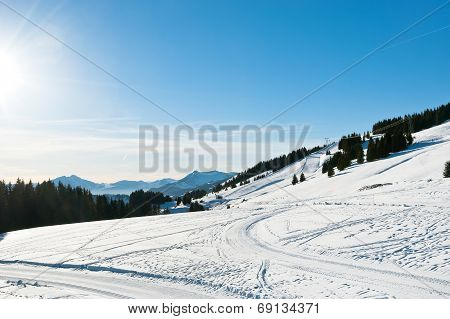 Snow Road And Ski Track Near Avoriaz Town In Alps