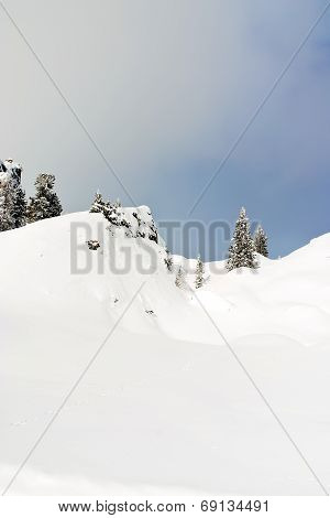 Snow-covered Mountain Slope In Dolomites, Italy