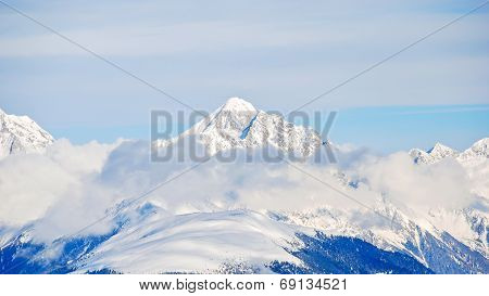 Snow-covered Mountain Peak In Dolomites, Italy