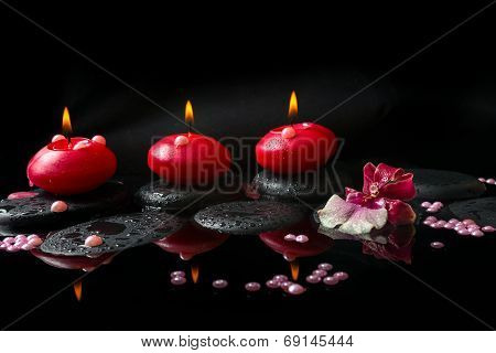 Spa Concept Of White And Red Orchid (cambria), Three  Red Candles And Pearl Beads On Zen Stones With