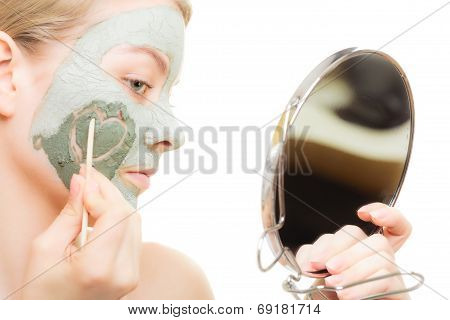 Skin Care. Woman In Clay Mud Mask On Face. Beauty.