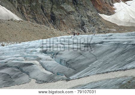 People On Glacier (steigletscher) In Alps In Switzerland