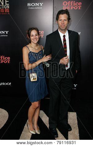 NEW YORK-AUG 26: Director of photography Tom Krueger (R) and guest attend the New York premiere of 'One Direction: This Is Us' at the Ziegfeld Theater on August 26, 2013 in New York City.