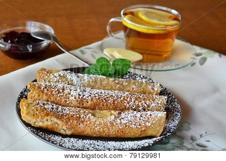 Pancake With Cherry Jam And Cup Of Tea. Creps.