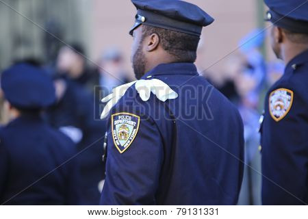 NYPD officer with white gloves