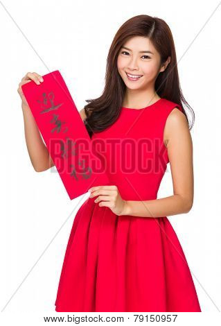 Woman hold with fai chun, word meaning is blessing good luck