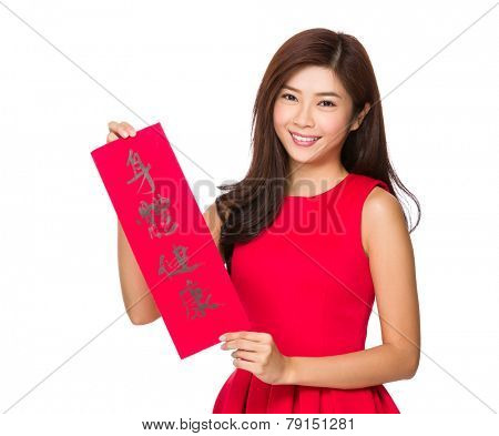 Woman hold with fai chun, phrase meaning is blessing for good health 
