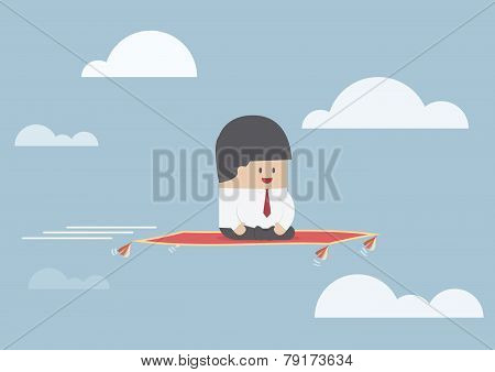 Businessman Sitting On The Flying Carpet