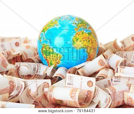 Globe against five thousandth Russian banknotes