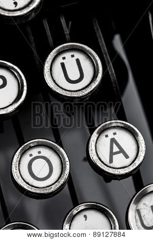 german umlauts on an old typewriter. symbolic photo for communication in former times