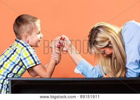 Mother And Son Arm Wrestling.